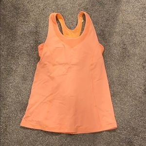 I’m selling an orange Lululemon tank!